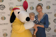 th_83491_Celebutopia_Kelly_Rutherford_The_Easter_Beagle_Presents_Canine_Couture_at_Palm_Beach_Fashion_Week_06_122_183lo.jpg