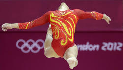 http://img270.imagevenue.com/loc382/th_786623168_WomenGymnastic6_122_382lo.jpg
