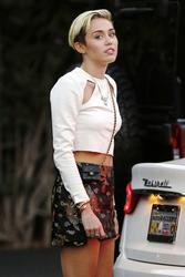 http://img270.imagevenue.com/loc146/th_542572471_Miley_Cyrus_081313_JKERD004_122_146lo.jpg